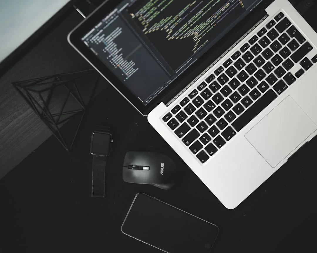 A tablet with a financial website open, alongside a white keyboard and mouse. Ideal for tech-theme stock images.